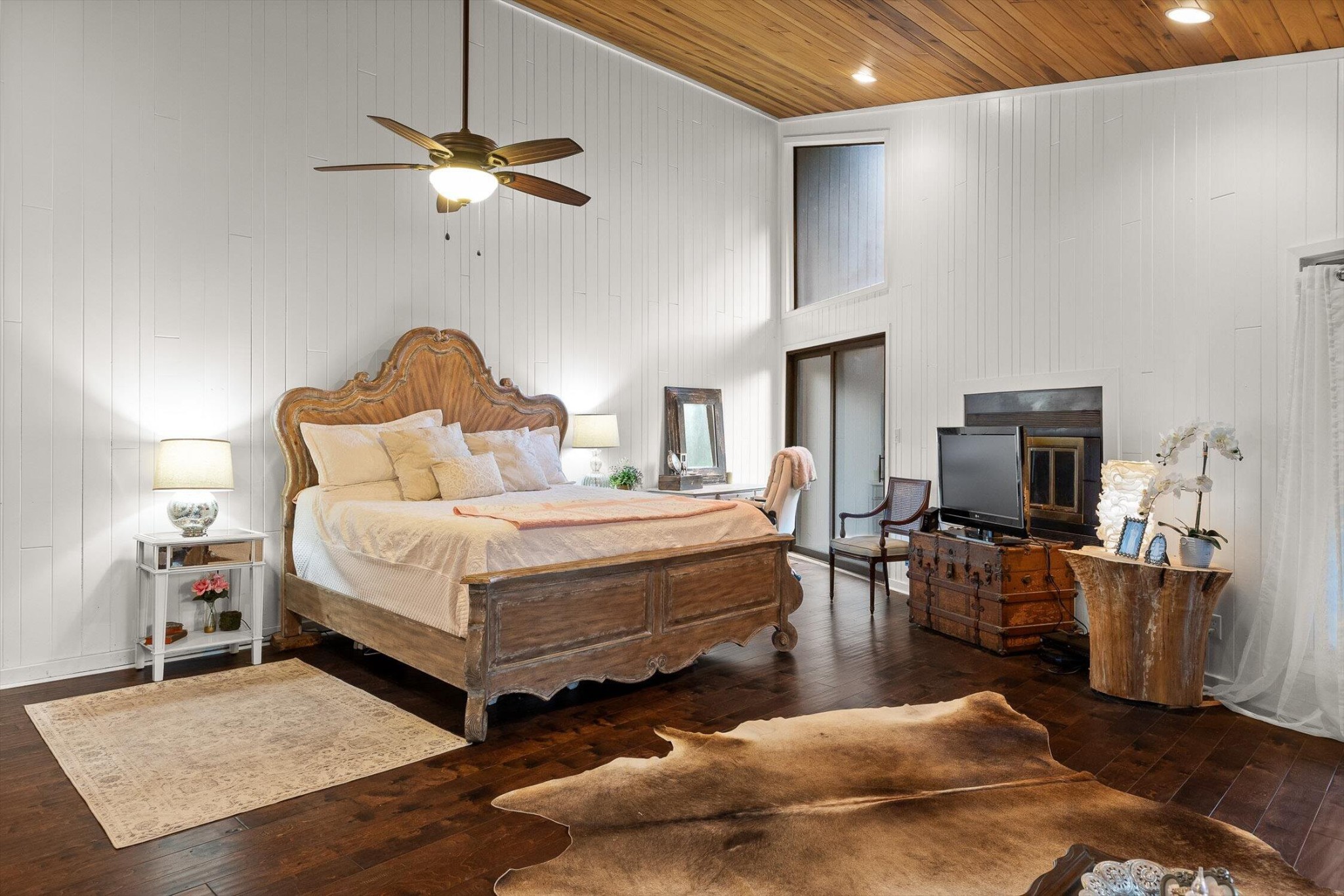 657 Brock Road Chickamauga, GA 30707 - Photo 37 of 55 a bed room with a bed and a chandelier