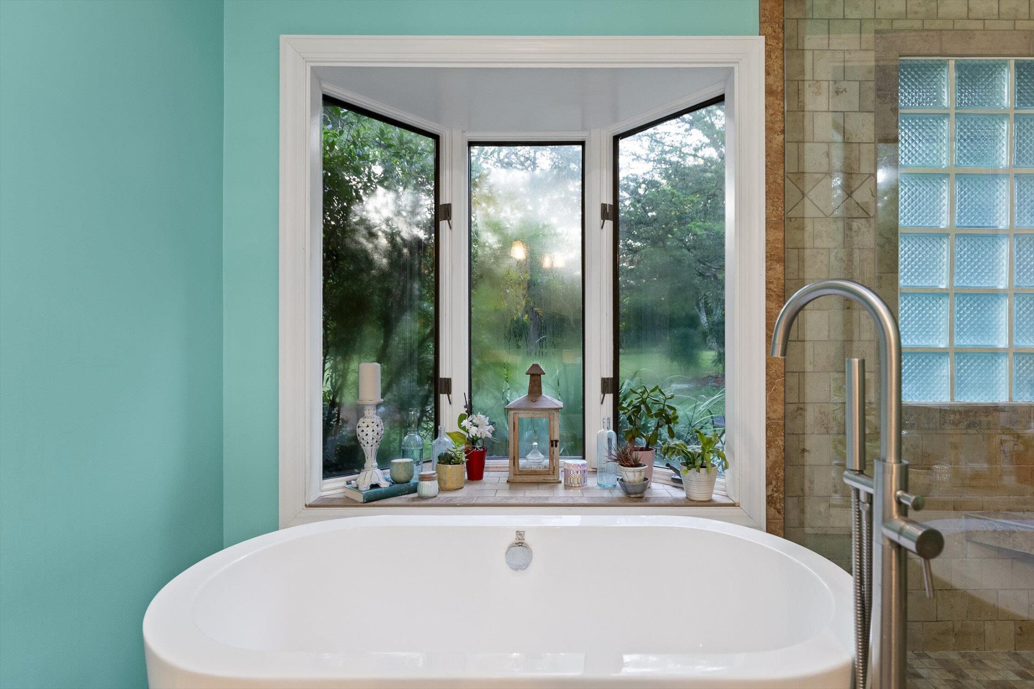 657 Brock Road Chickamauga, GA 30707 - Photo 42 of 55 a white bath tub sitting in front of a window