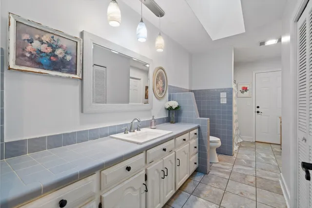 a view of yard with large trees