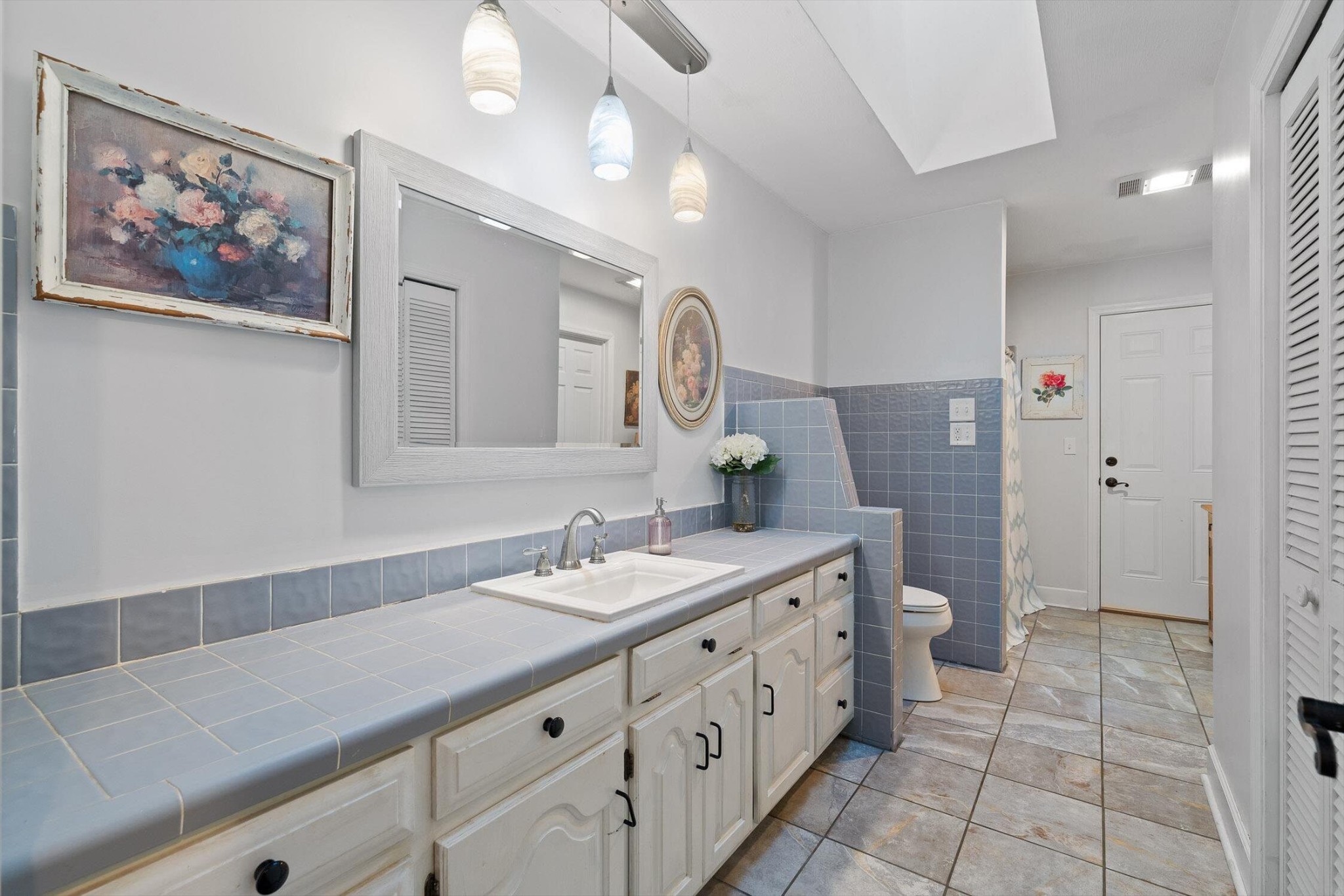 657 Brock Road Chickamauga, GA 30707 - Photo 46 of 55 a spacious bathroom with a double vanity sink and a mirror