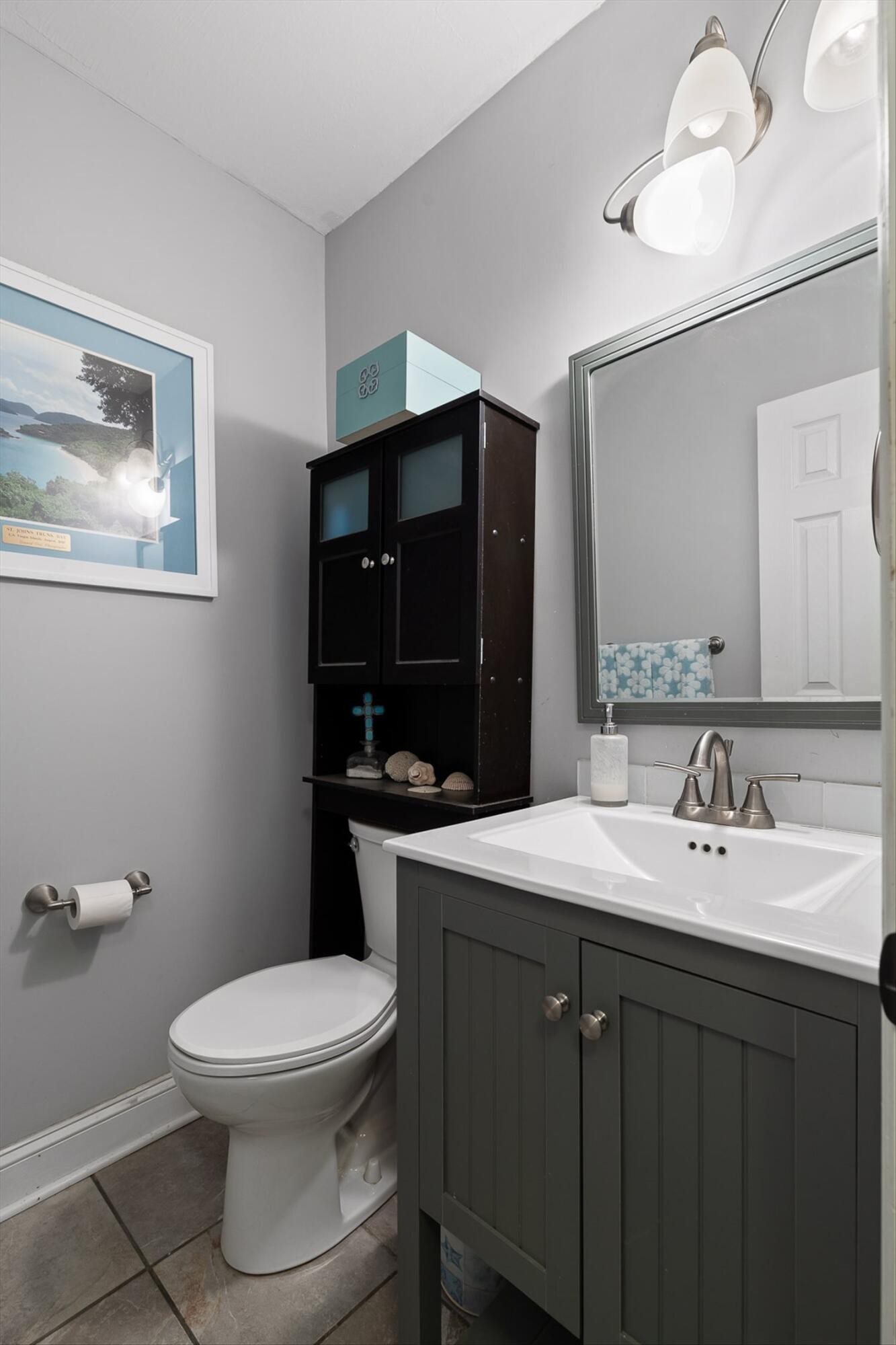 657 Brock Road Chickamauga, GA 30707 - Photo 47 of 55 a bathroom with a toilet sink double vanity and mirror