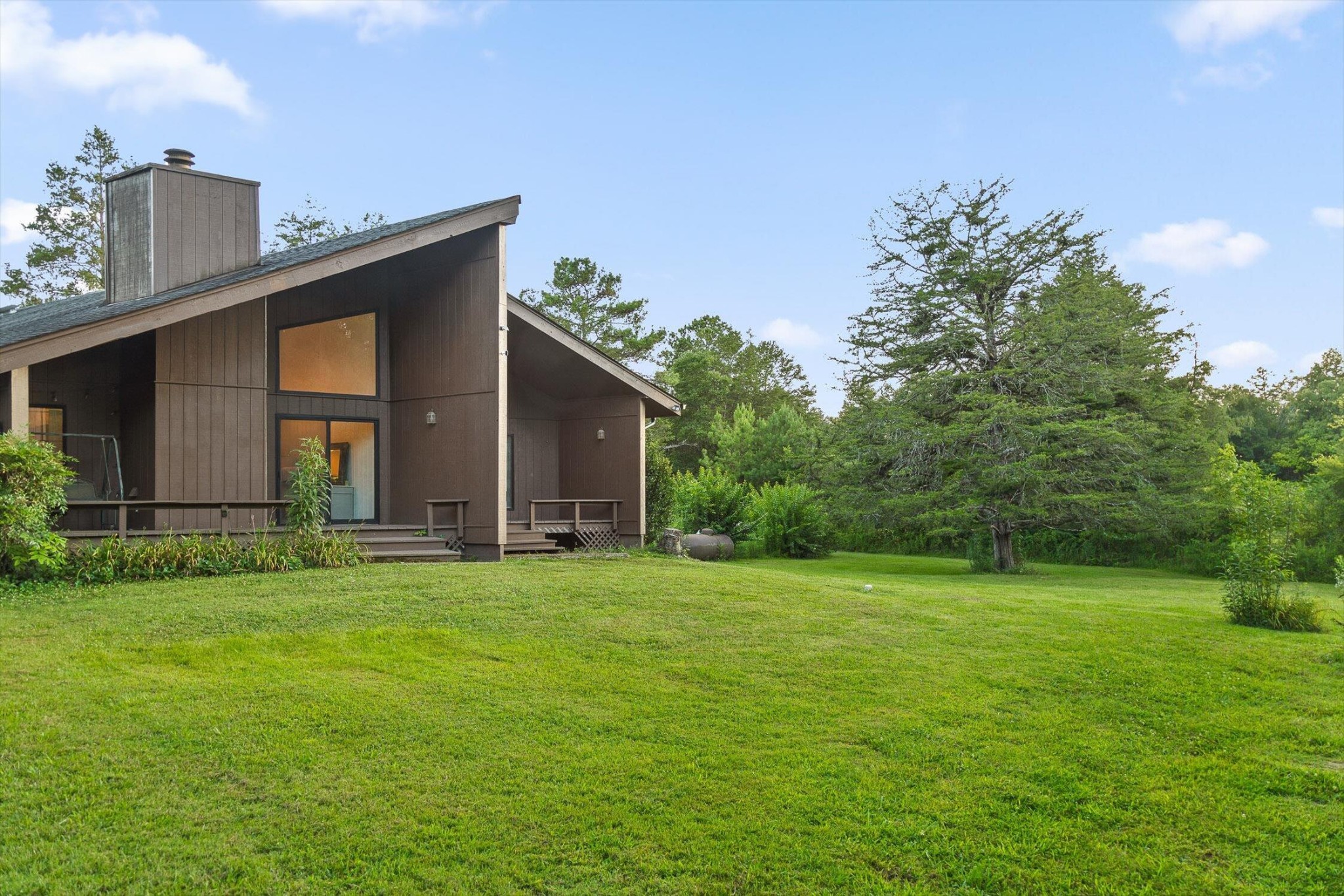 657 Brock Road Chickamauga, GA 30707 - Photo 49 of 55 a view of a house with a yard and garage