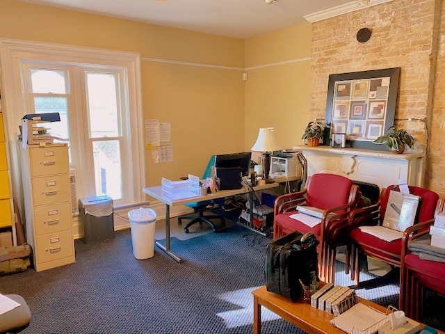 438 North Sheridan Road Waukegan, IL 60085 - Photo 11 of 21 a living room with furniture and a window