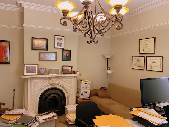 438 North Sheridan Road Waukegan, IL 60085 - Photo 15 of 21 a living room with furniture and a fireplace