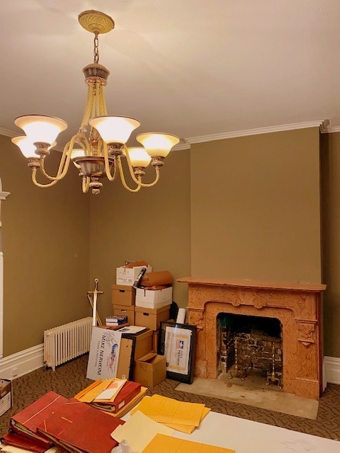 438 North Sheridan Road Waukegan, IL 60085 - Photo 8 of 21 a bedroom with a bed and a chandelier