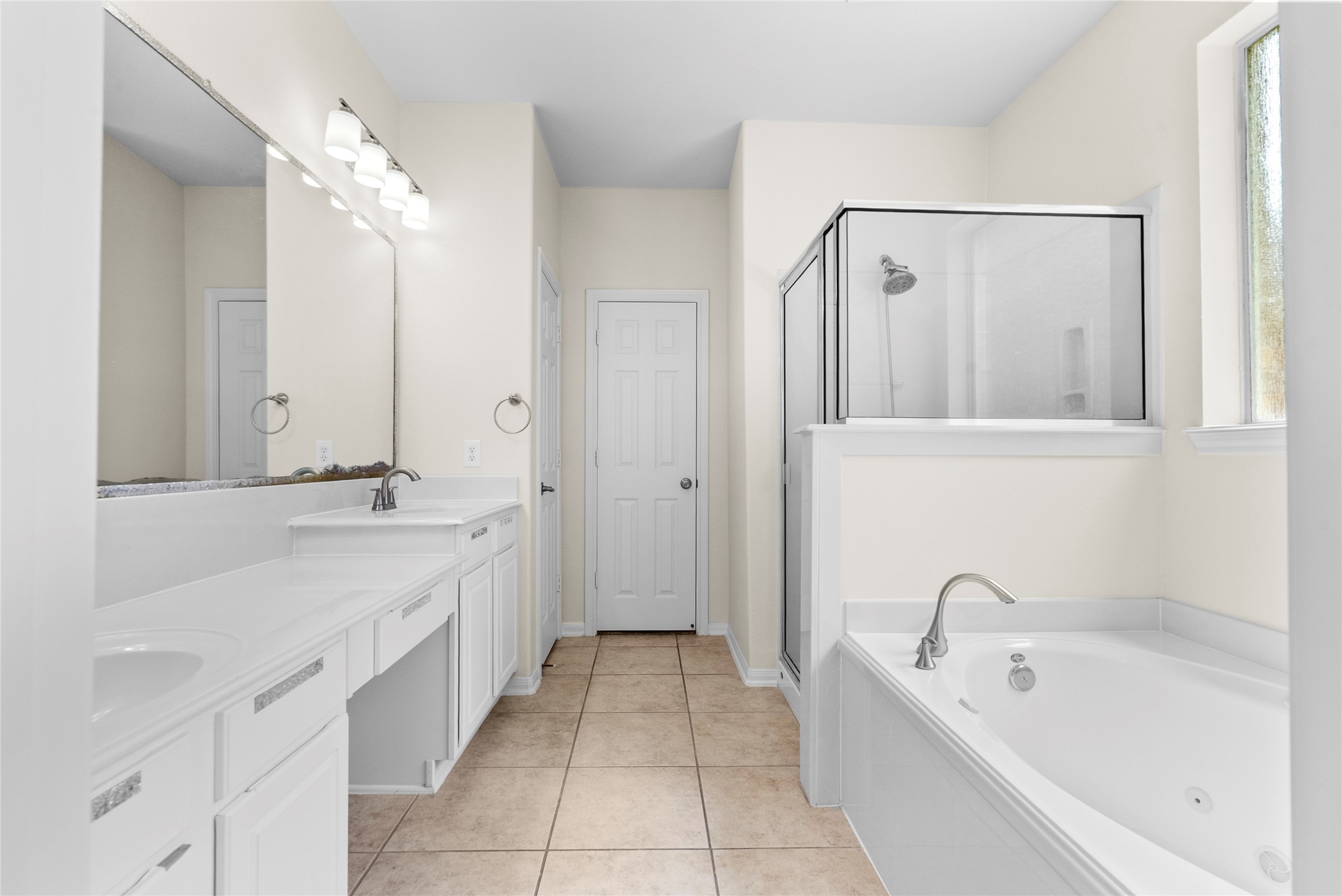 6407 Pine Rest Drive Spring, TX 77389 - Photo 15 of 26 a spacious bathroom with a tub sink and mirror