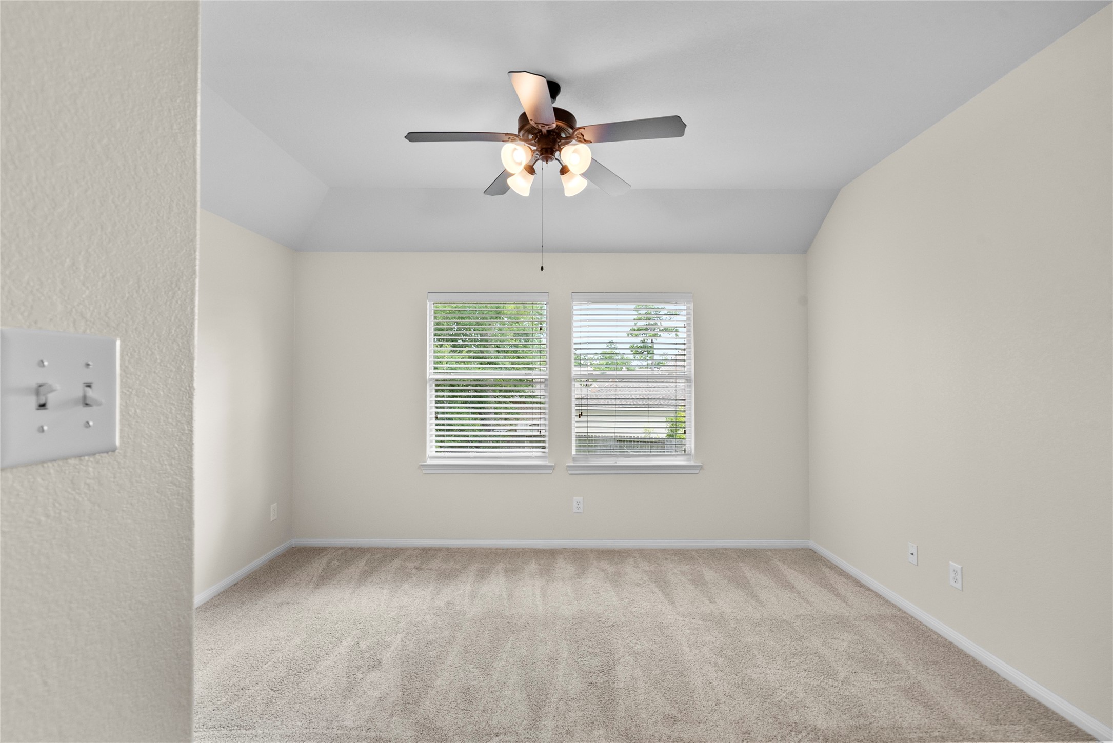 6407 Pine Rest Drive Spring, TX 77389 - Photo 23 of 26 an empty room with a window and a fan
