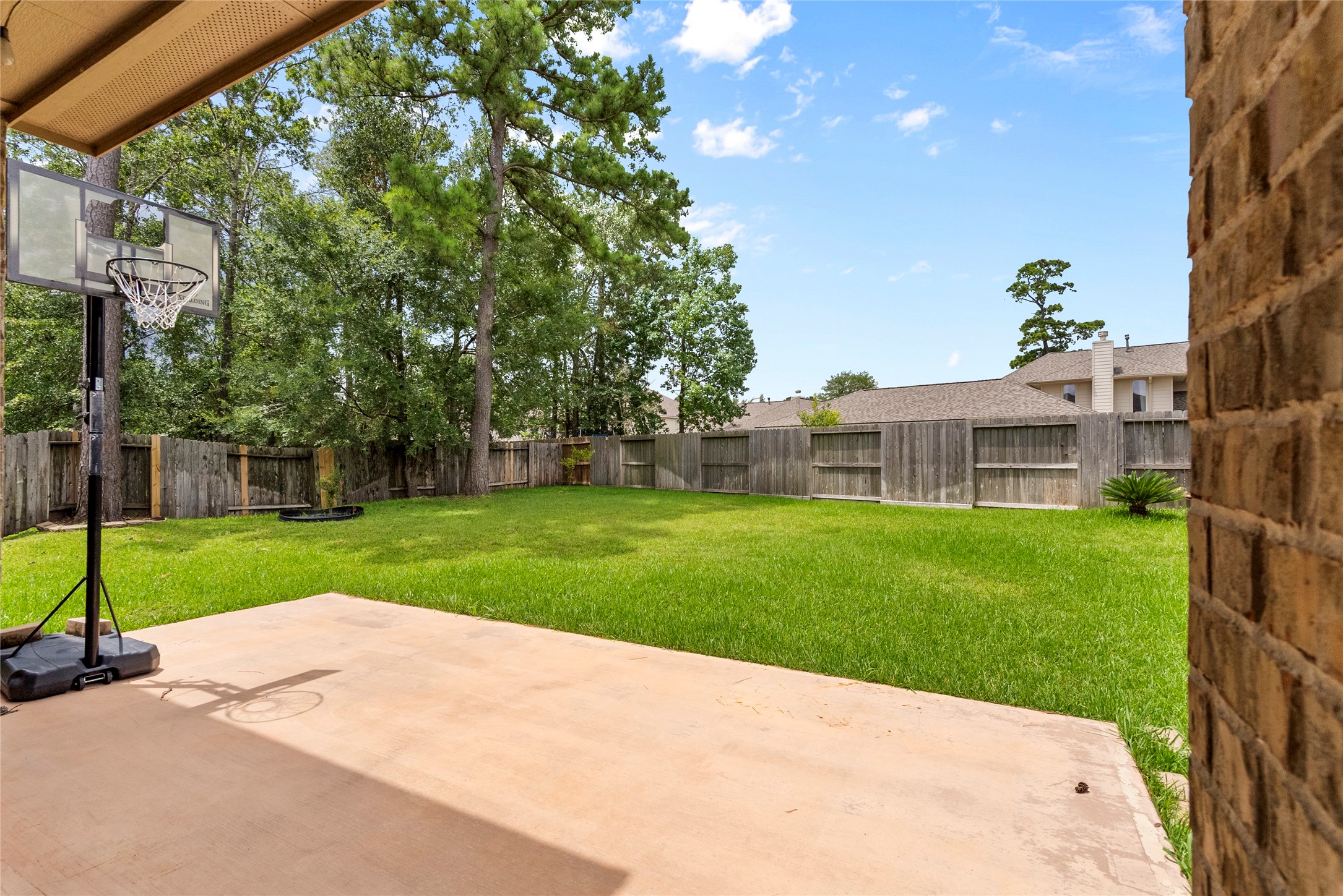 6407 Pine Rest Drive Spring, TX 77389 - Photo 25 of 26 a view of a house with a yard