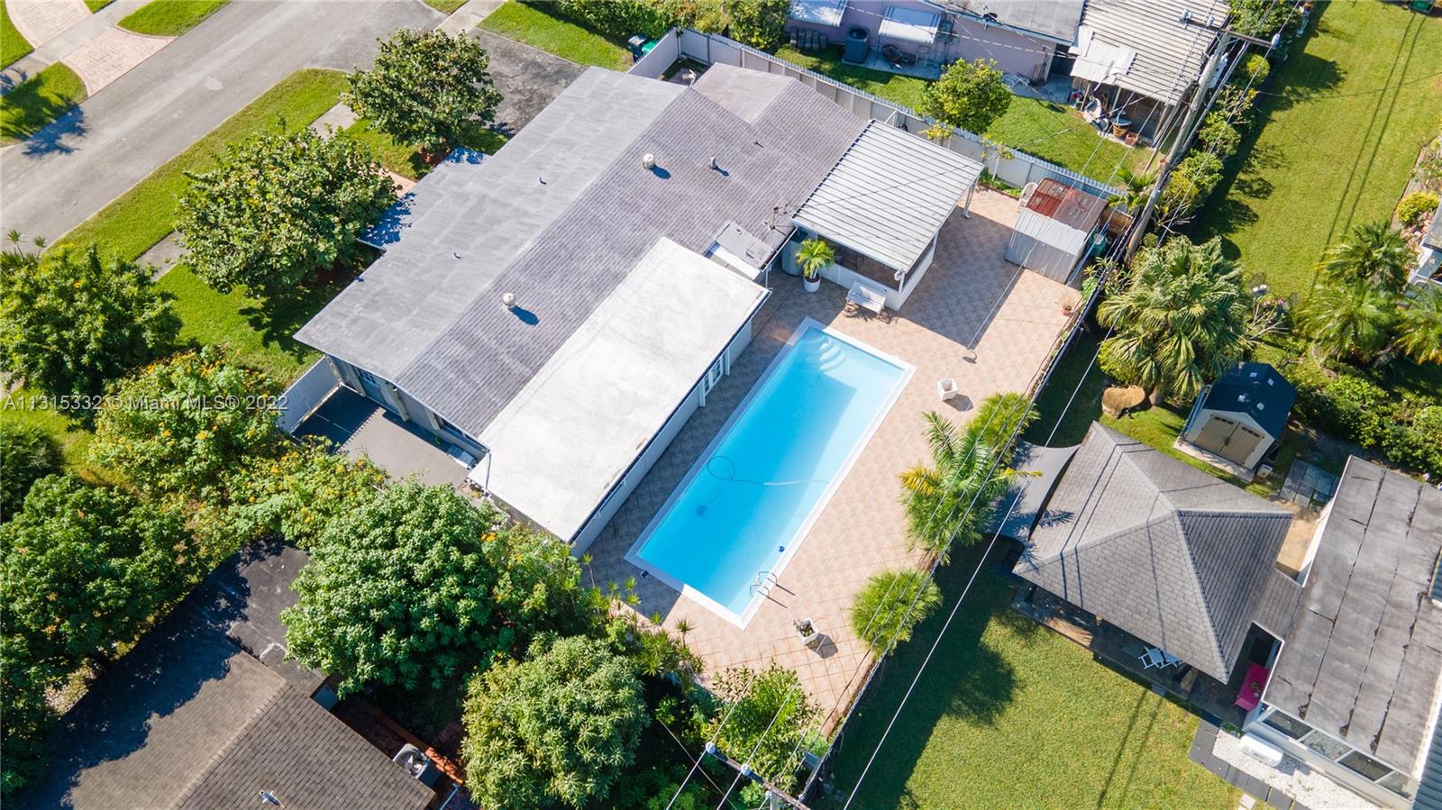9215 Southwest 45th Street, Unit 9215 Miami, FL 33165 - Photo 31 of 37 an aerial view of a house