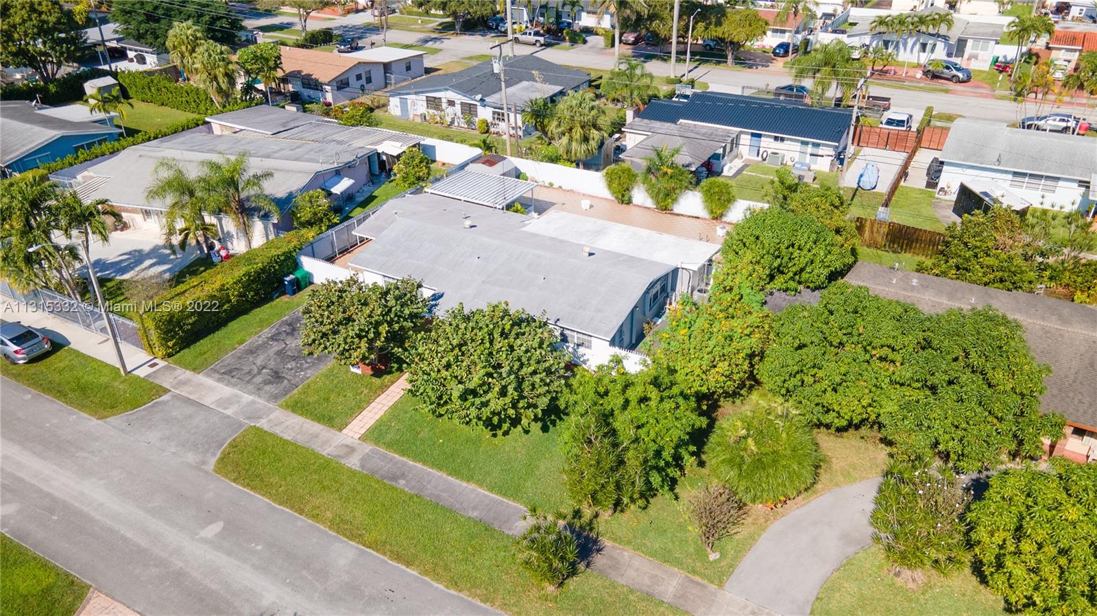 9215 Southwest 45th Street, Unit 9215 Miami, FL 33165 - Photo 33 of 37 an aerial view of a house with a yard basket ball court and outdoor seating