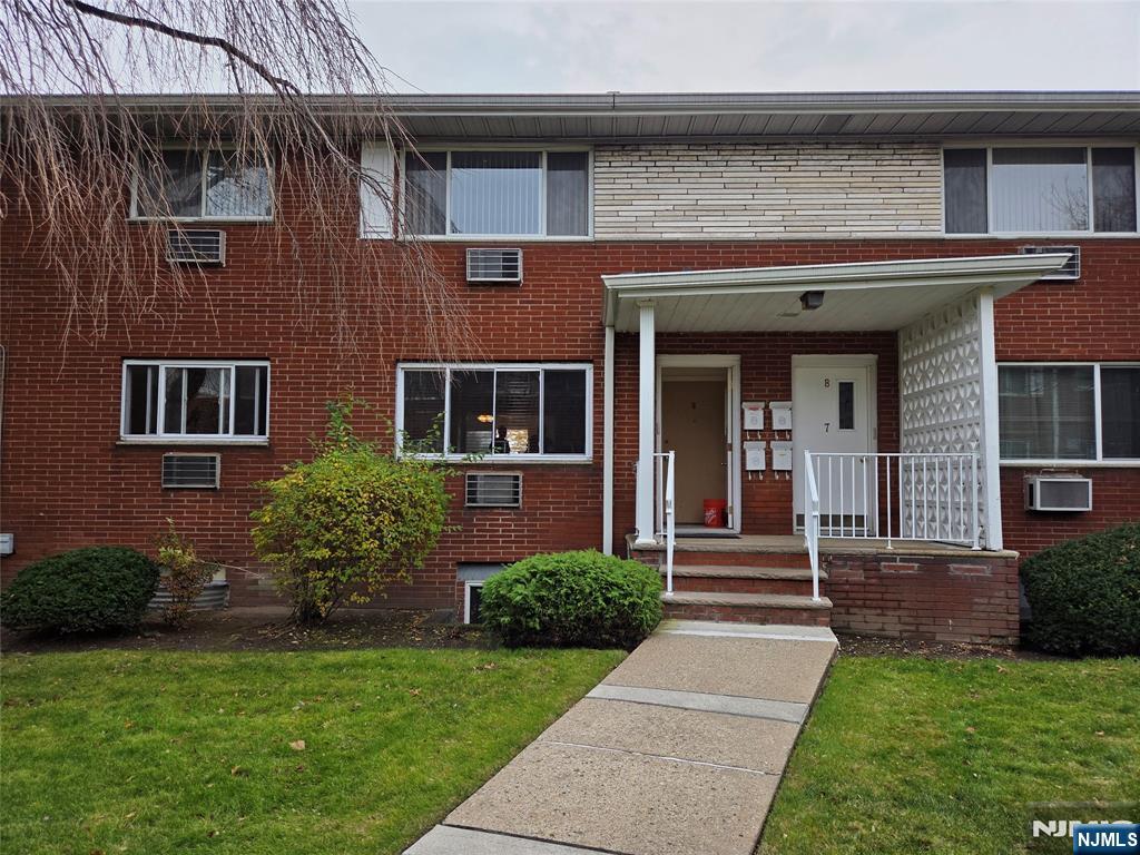 1315 Anderson Avenue, Unit 5 Fort Lee, NJ 07024 - Photo 12 of 16 a front view of a house with garden