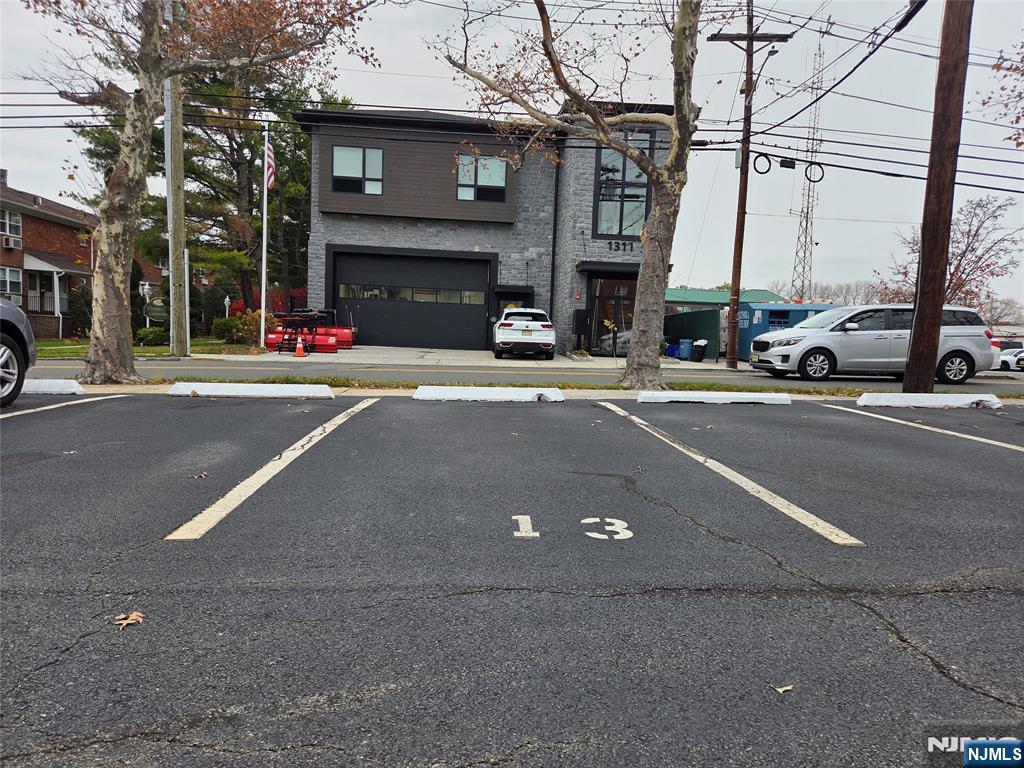 1315 Anderson Avenue, Unit 5 Fort Lee, NJ 07024 - Photo 15 of 16 a front view of a building with street view