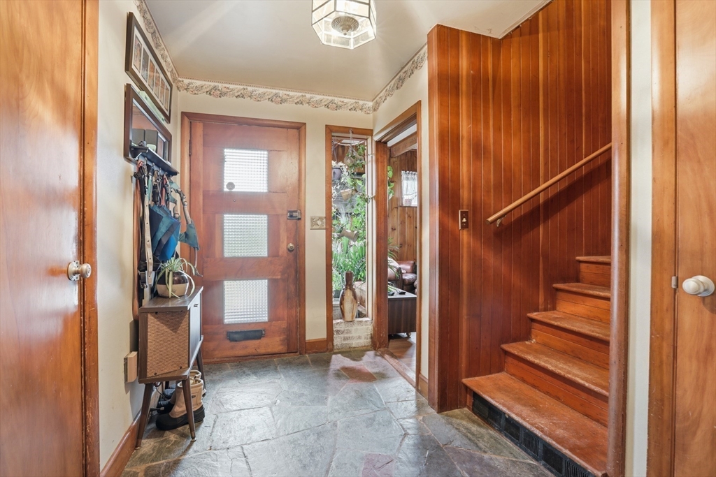 22 Burdett Road Lynn, MA 01904 - Photo 3 of 30 a view of an entryway with wooden floor and a hallway