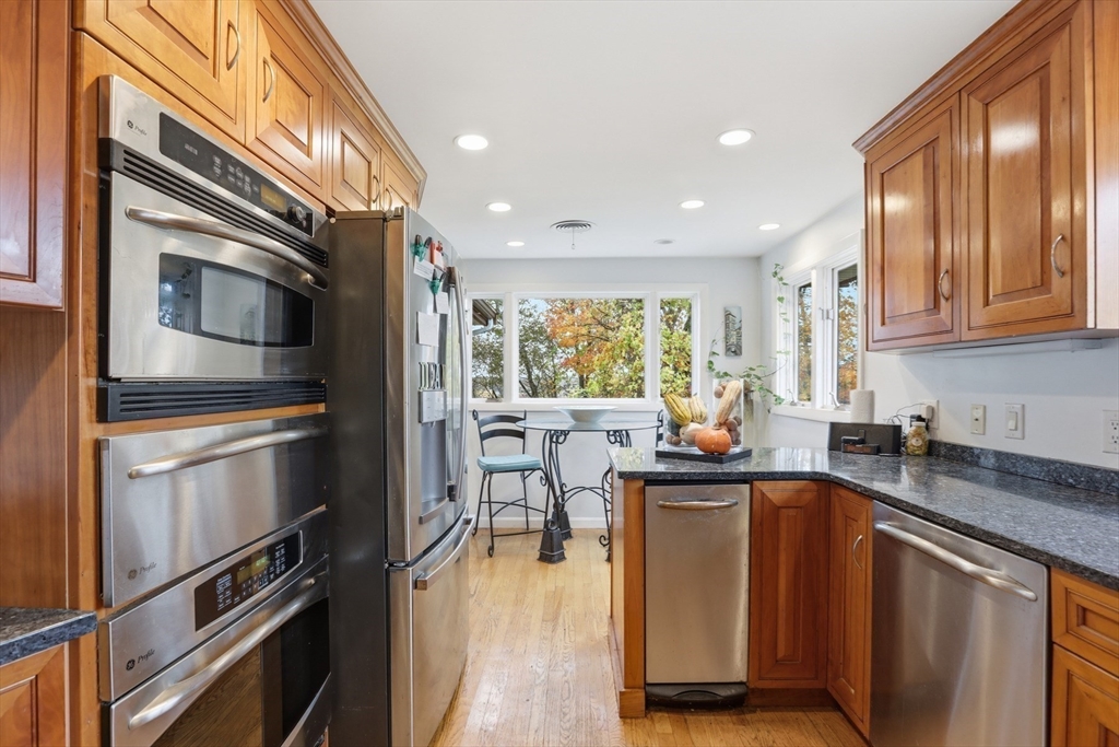 22 Burdett Road Lynn, MA 01904 - Photo 10 of 30 a kitchen with lots of counter top space and appliances