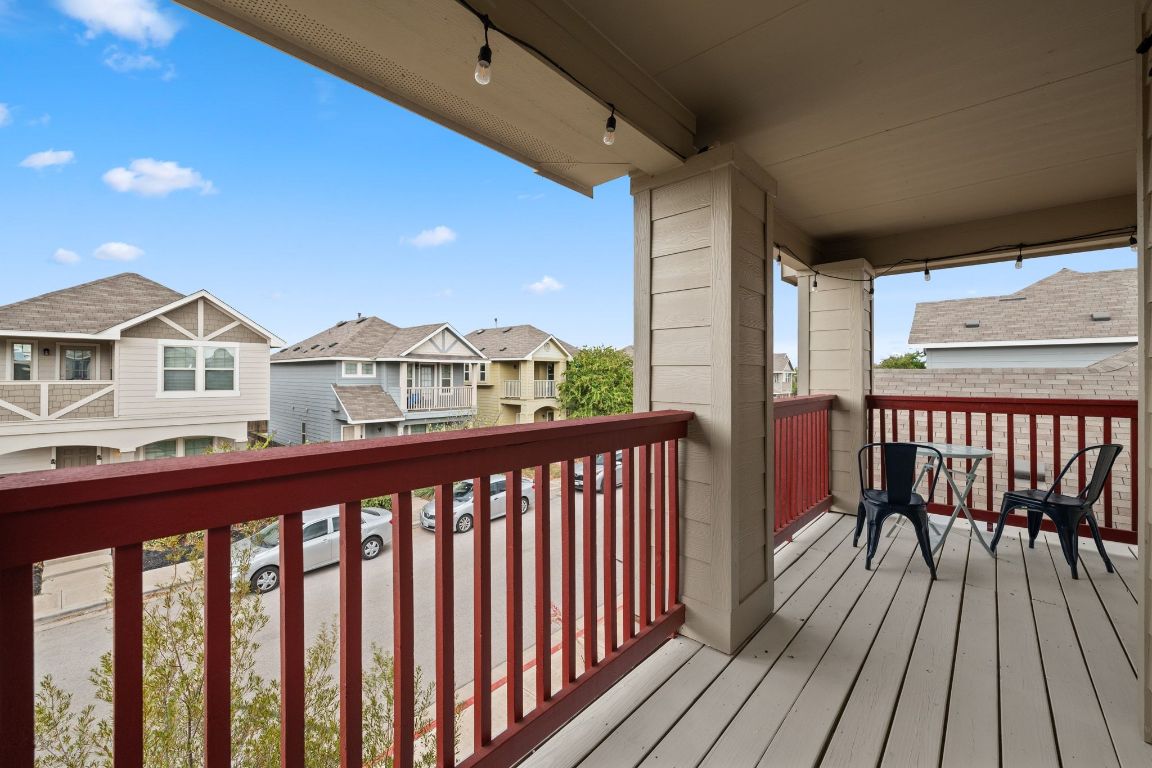 4517 Truth Way, Unit 412 Austin, TX 78725 - Photo 6 of 25 a view of a street from a balcony