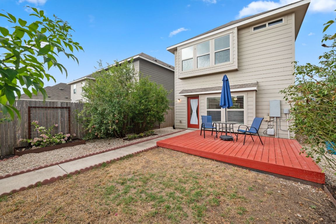 4517 Truth Way, Unit 412 Austin, TX 78725 - Photo 7 of 25 a view of a house with backyard and sitting area