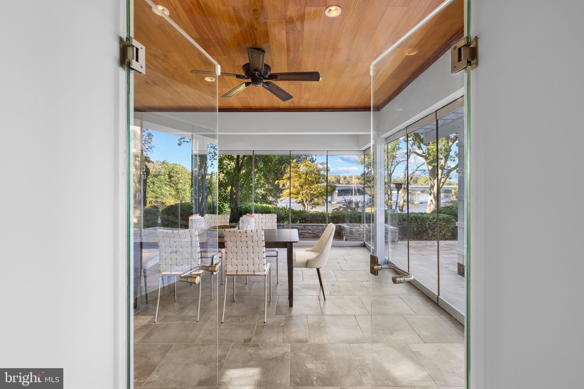 411 Ridgely Avenue Annapolis, MD 21401 - Photo 13 of 48 Double glass doors to sunroom