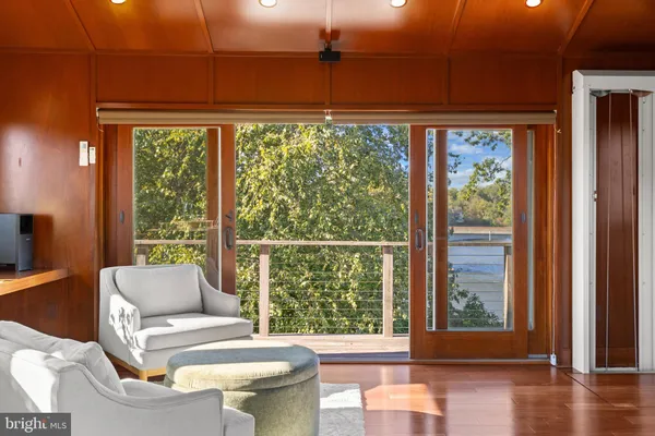 a living room with couch and a window