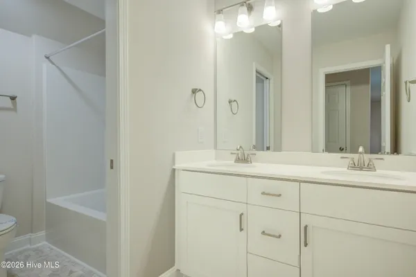 $304,900 | 215 Sandpiper Place, Sneads Ferry, NC 28460