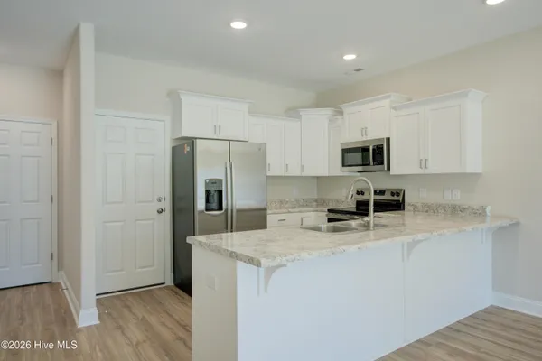 $304,900 | 215 Sandpiper Place, Sneads Ferry, NC 28460