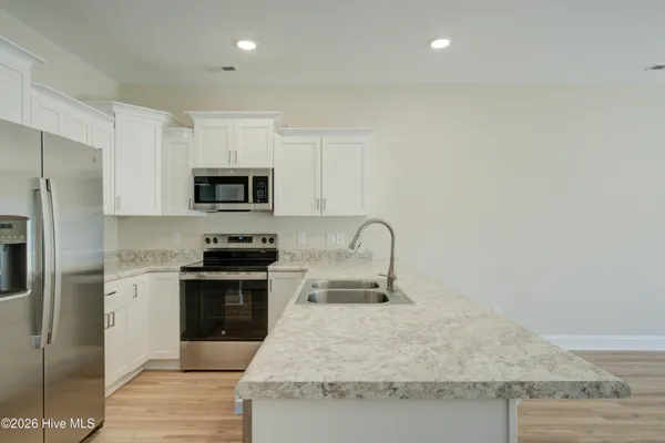 $304,900 | 215 Sandpiper Place, Sneads Ferry, NC 28460