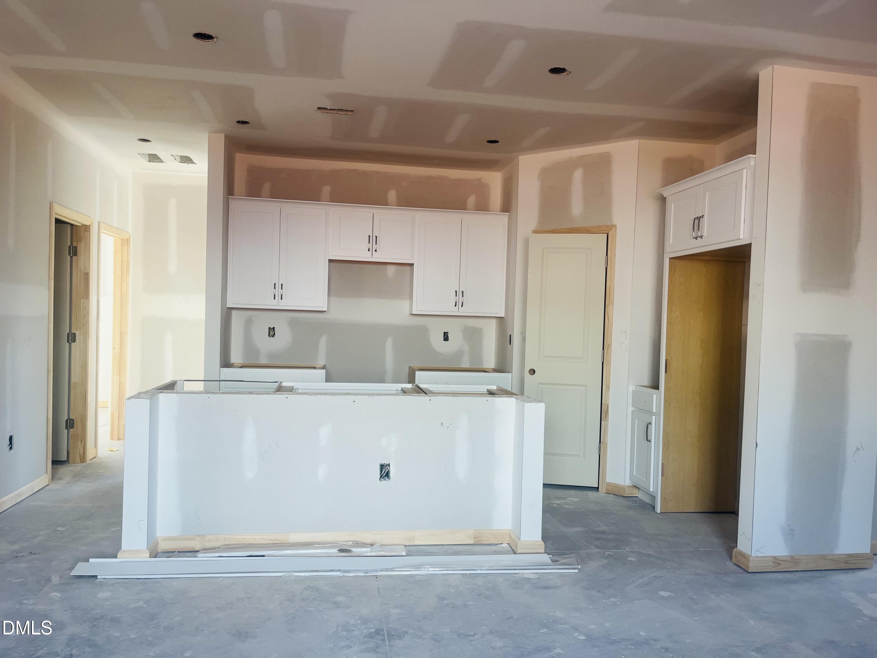 11695 Salers Loop Middlesex, NC 27557 - Photo 15 of 29 a view of kitchen with refrigerator stove and a sink