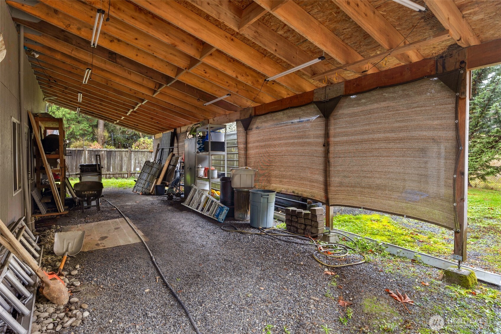 525 192nd Place Southeast Bothell, WA 98012 - Photo 20 of 22 a view of a garage with the table and chairs