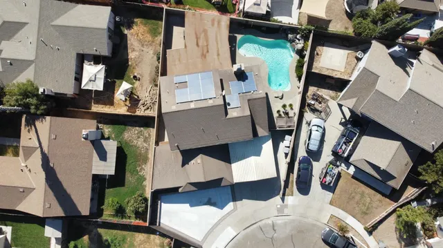 a view of a house with a fence