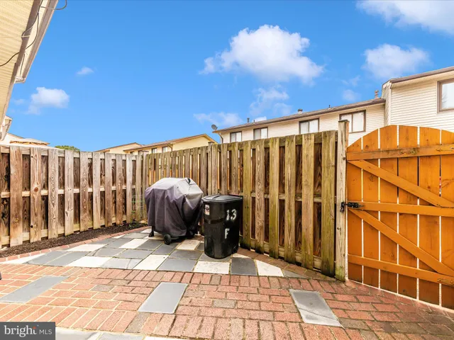 a view of a balcony with furniture