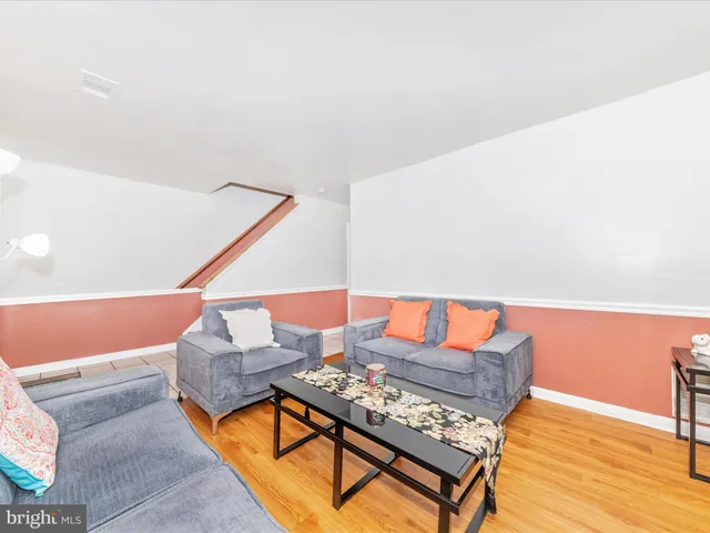 a kitchen with stainless steel appliances and cabinets