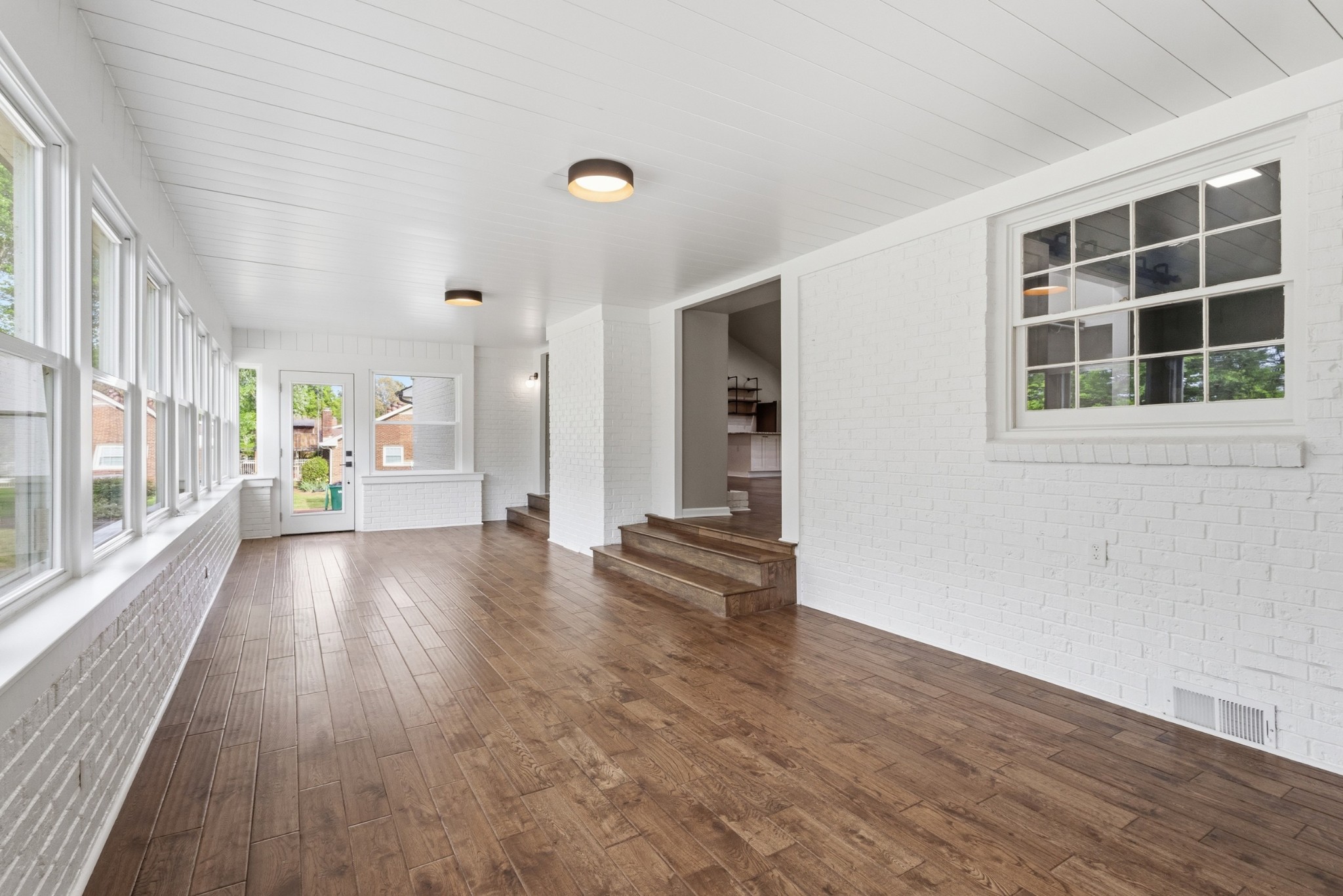 2228 Bowman Road Franklin, TN 37064 - Photo 16 of 44 a view of an empty room with wooden floor and a window