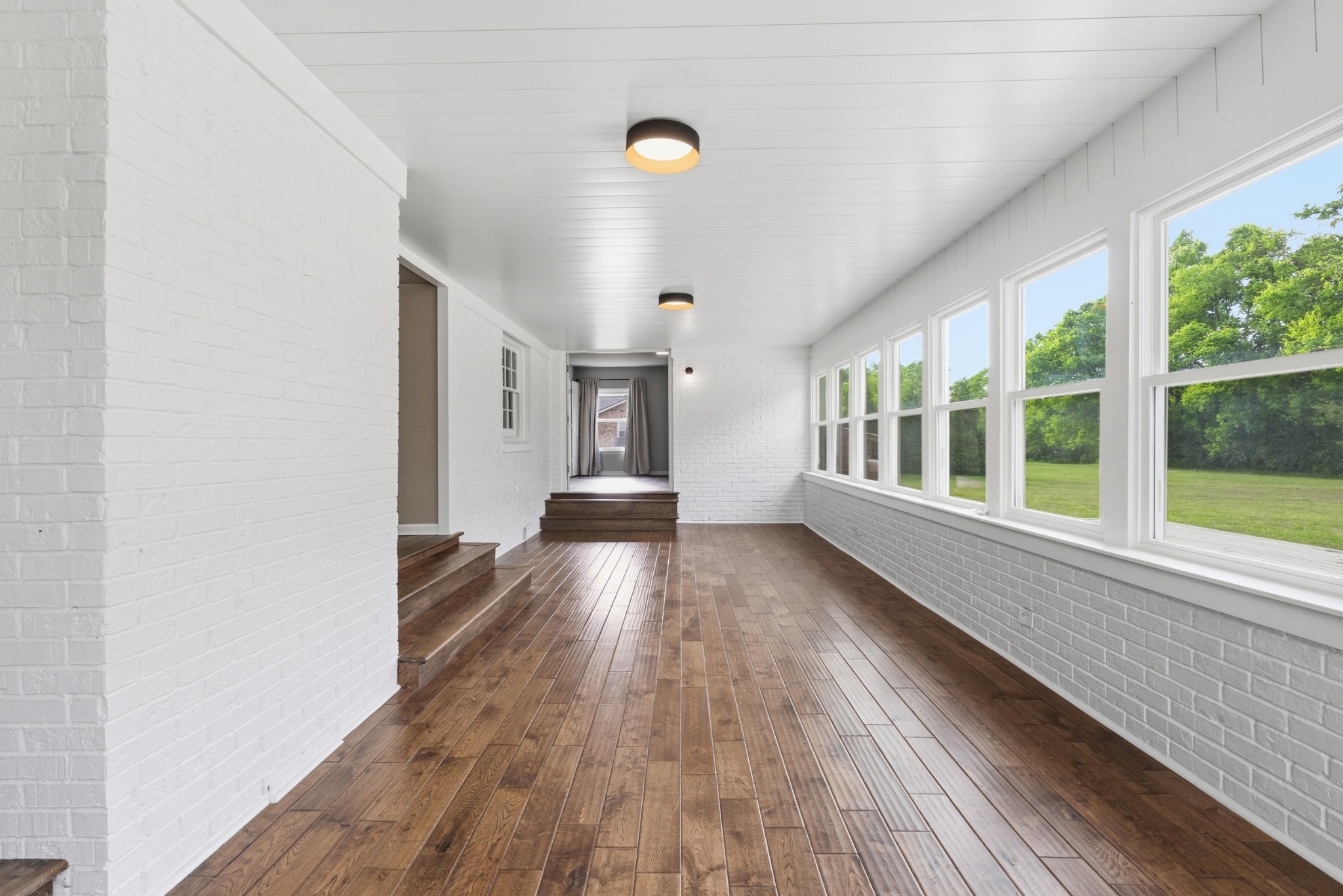 2228 Bowman Road Franklin, TN 37064 - Photo 17 of 44 wooden floor in an empty room with a window