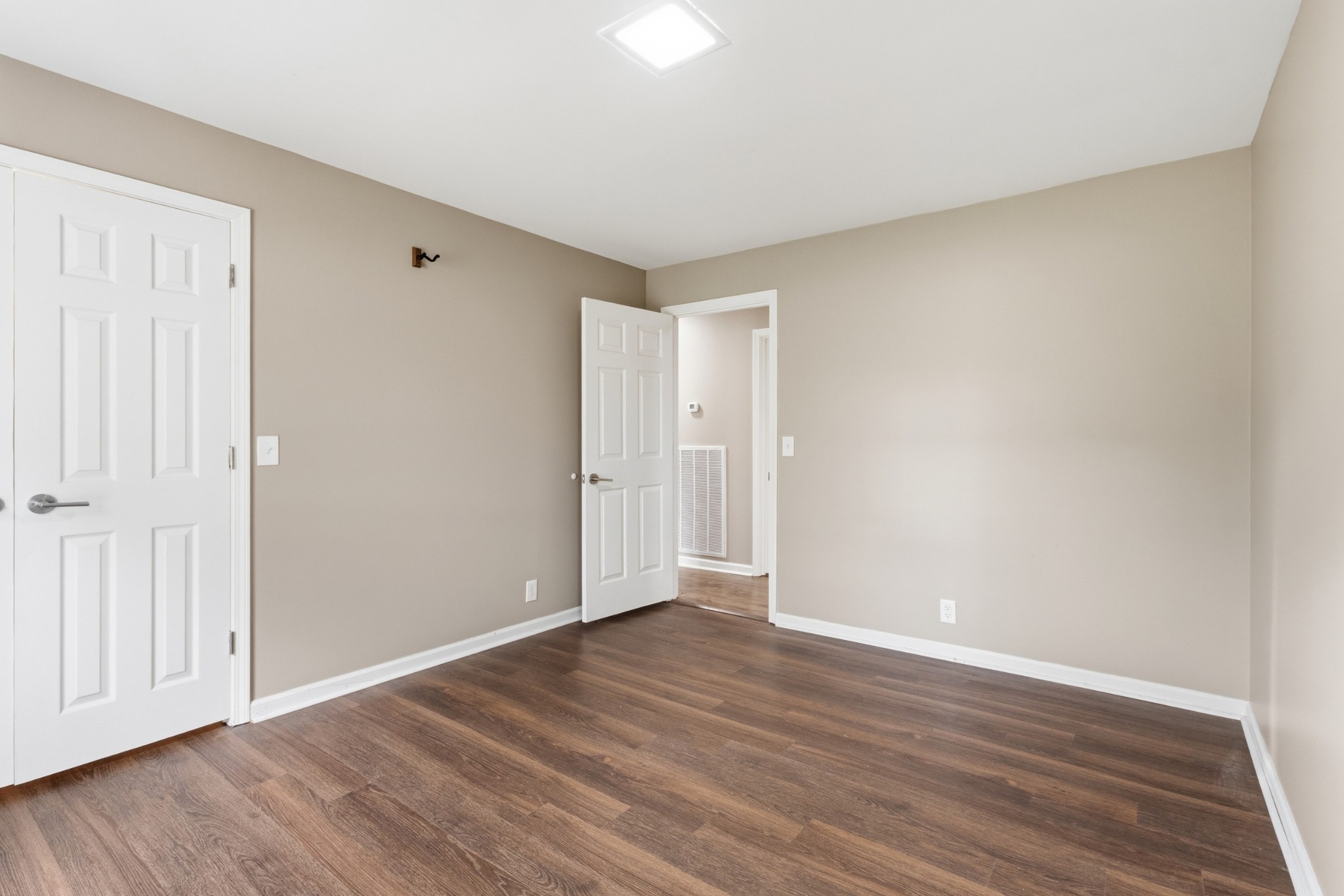 2228 Bowman Road Franklin, TN 37064 - Photo 24 of 44 a view of an empty room with wooden floor