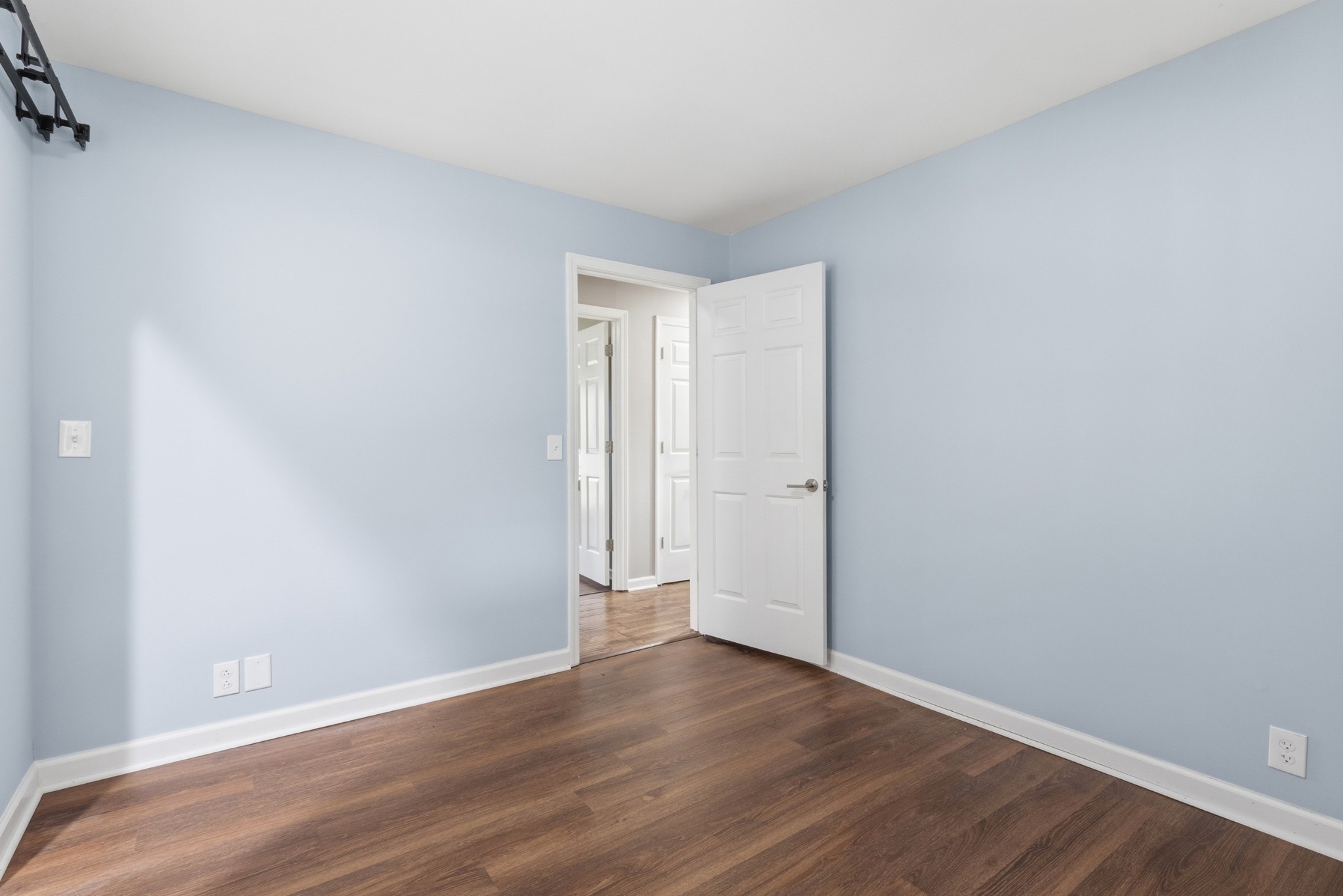 2228 Bowman Road Franklin, TN 37064 - Photo 26 of 44 a view of an empty room with wooden floor