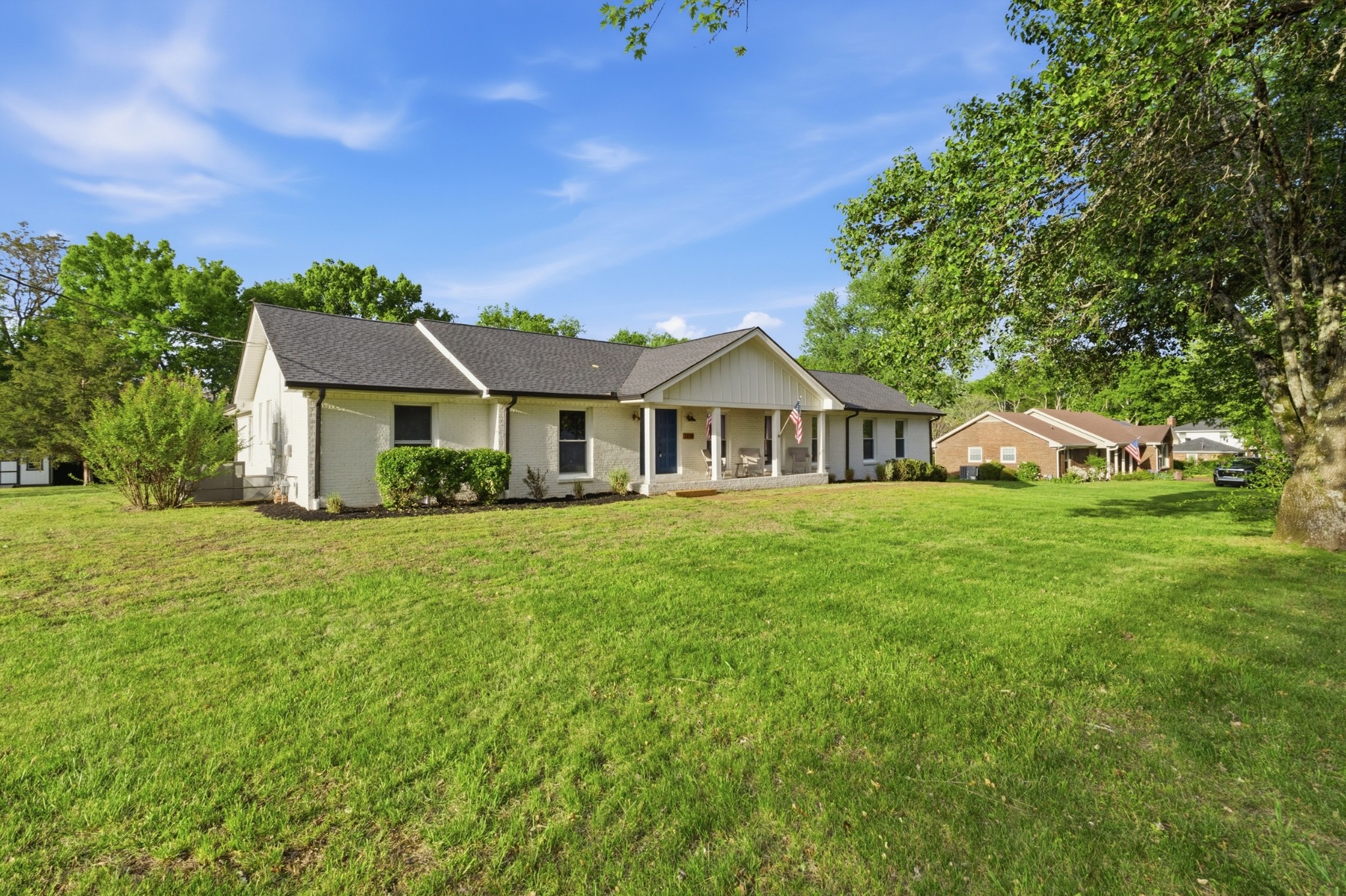 2228 Bowman Road Franklin, TN 37064 - Photo 3 of 44 a front view of a house with yard and green space