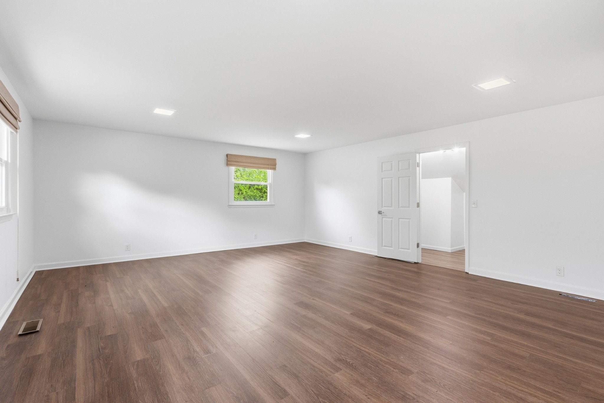 2228 Bowman Road Franklin, TN 37064 - Photo 31 of 44 an empty room with wooden floor and windows