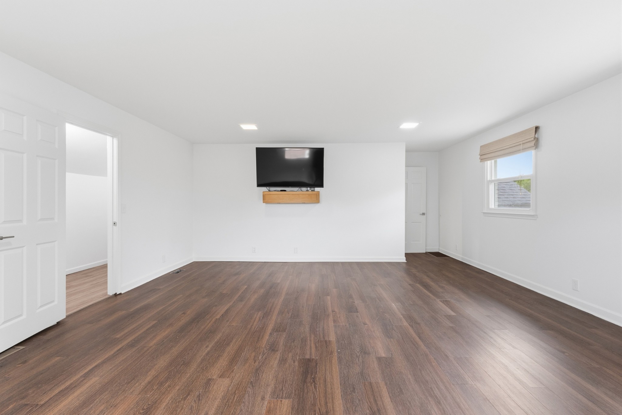 2228 Bowman Road Franklin, TN 37064 - Photo 32 of 44 an empty room with wooden floor and windows