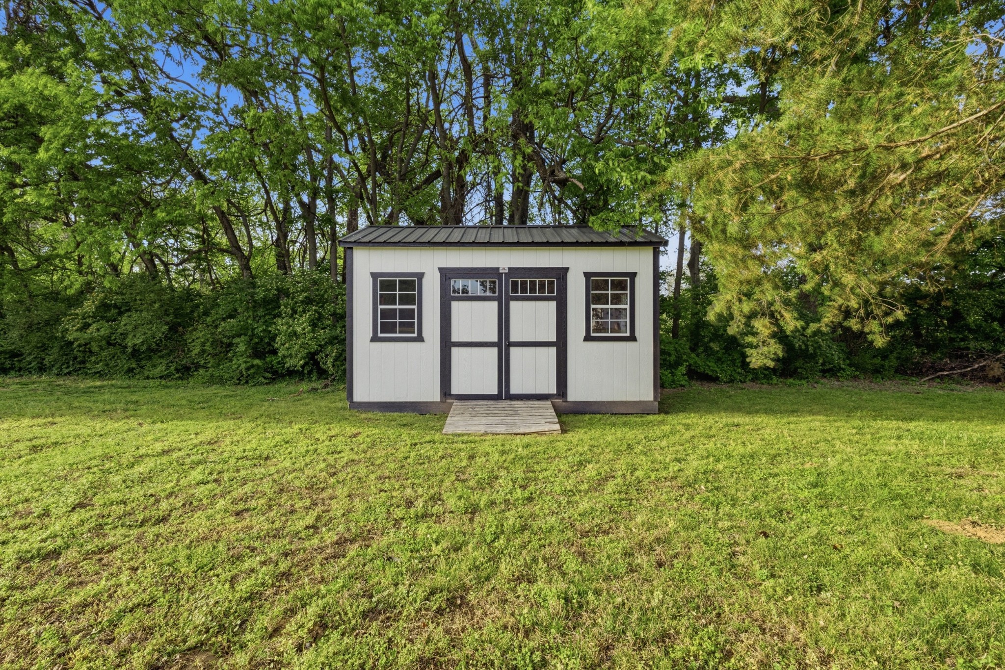 2228 Bowman Road Franklin, TN 37064 - Photo 40 of 44 front view of a house with a yard