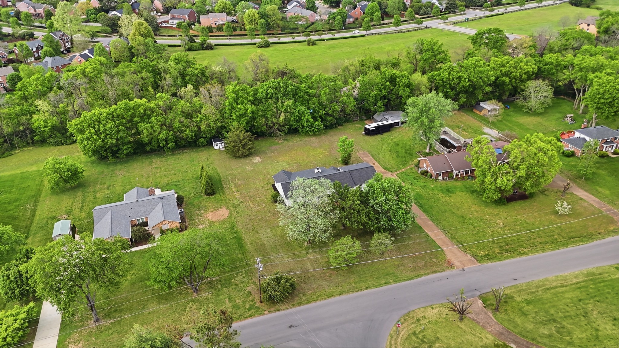 2228 Bowman Road Franklin, TN 37064 - Photo 43 of 44 an aerial view of a houses with a yard and lake view