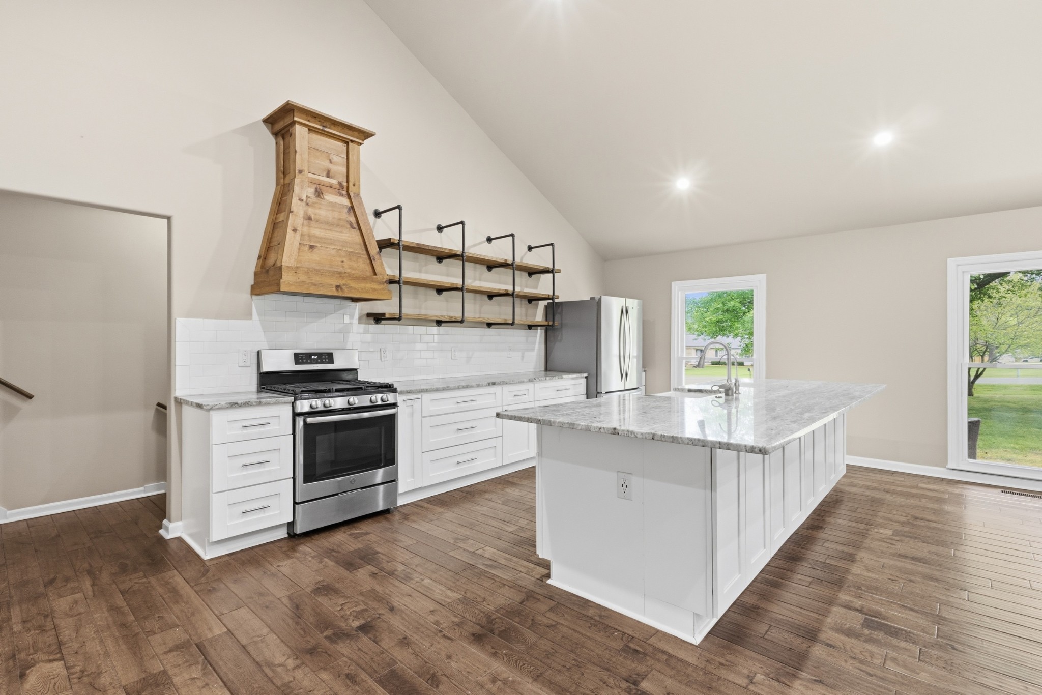 2228 Bowman Road Franklin, TN 37064 - Photo 9 of 44 a kitchen with stainless steel appliances a sink and a window