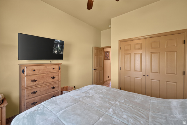 4635 East Sunny Acres Lane Moab, UT 84532 - Photo 28 of 56 Bedroom featuring a vaulted ceiling and a ceiling fan