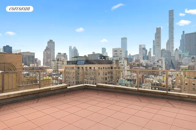 a view of a city with tall buildings