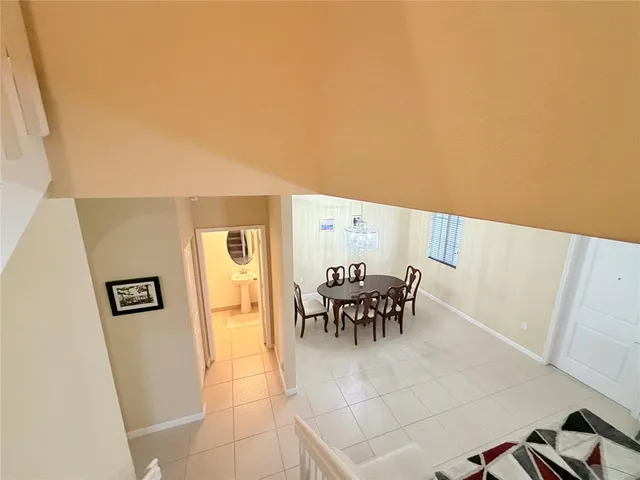 a view of dining room with furniture and wooden floor