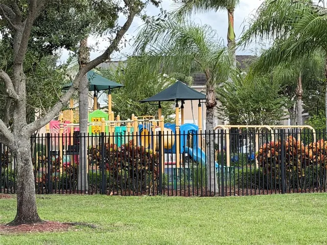 a view of a wrought iron fences in front of a house