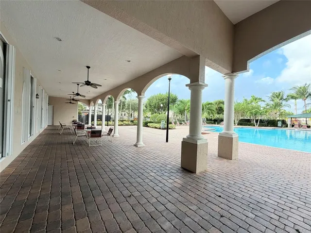 a view of a yard with a tree