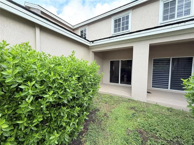 front view of a house with a small yard