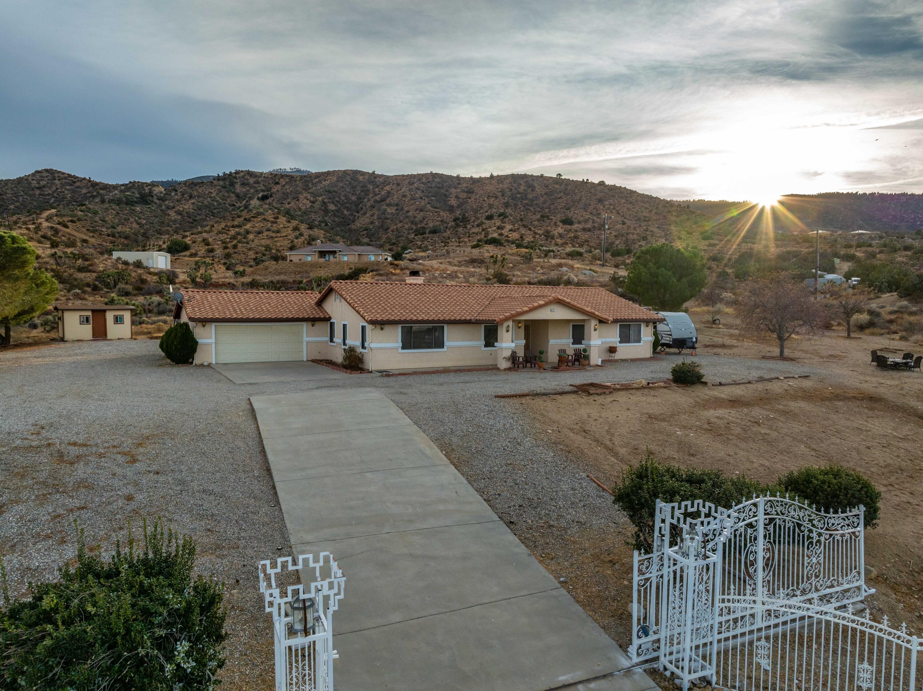 475 Maria Road Pinon Hills, CA 92372 - Photo 54 of 54 a view of multiple houses with a road