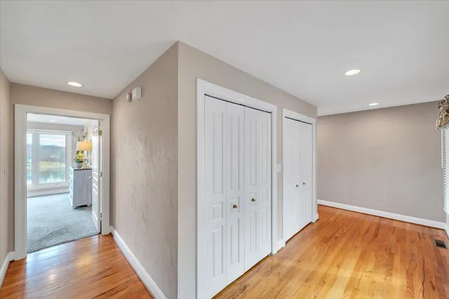 an aerial view of residential house with outdoor space and lake view