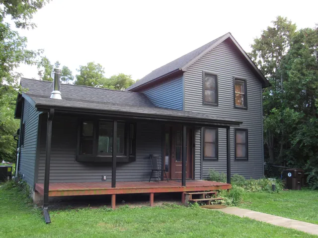 a front view of house with yard