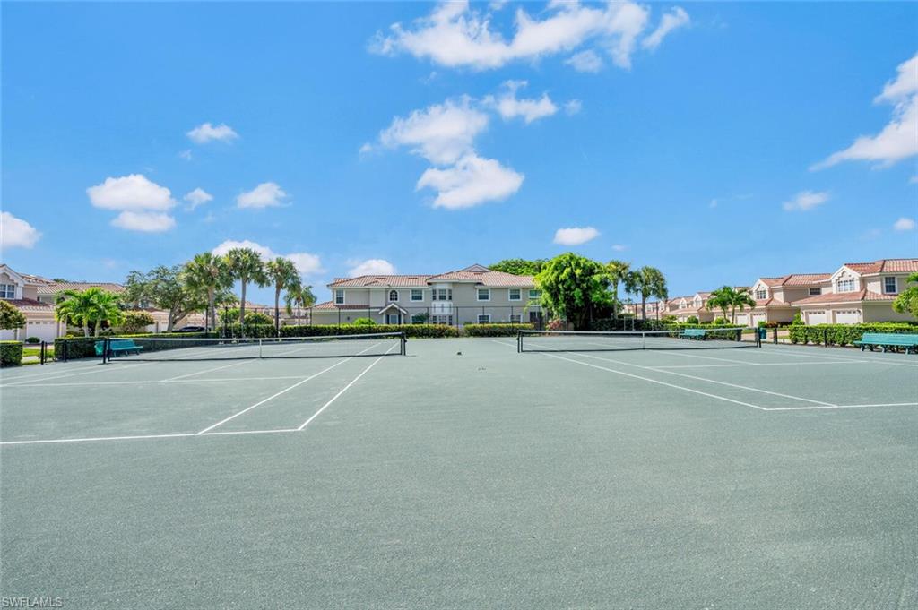 3520 Windjammer Circle, Unit 102 Naples, FL 34112 - Photo 24 of 26 a view of a tennis court